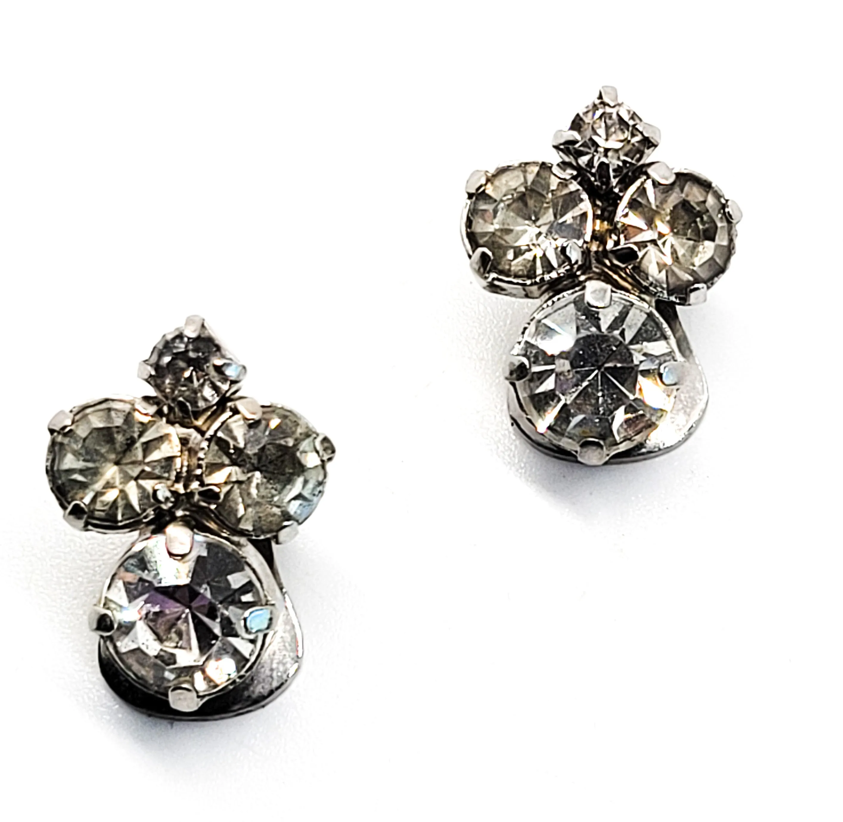 Bright vintage clear rhinestone silver toned button clip on earrings mid century