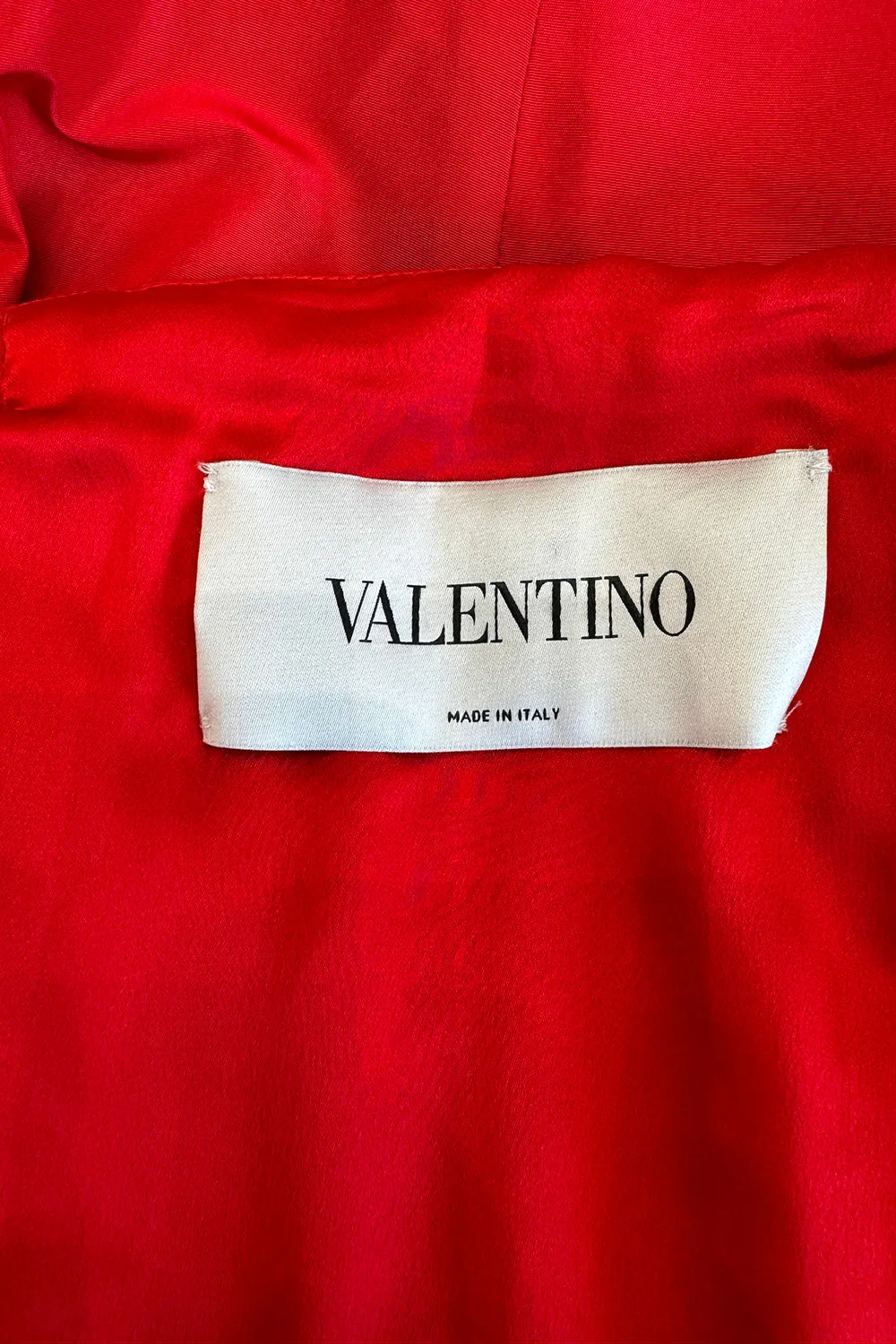 Fall 2004 Valentino Runway Look 53 Strapless red dress w Flowers on the Hips