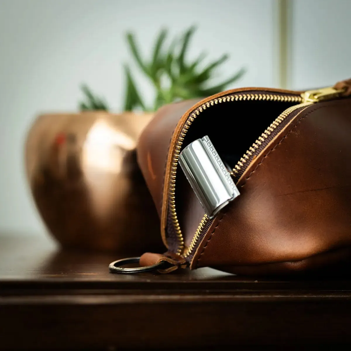 leather flat-lay toiletry bag