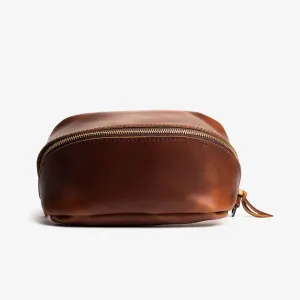 leather flat-lay toiletry bag